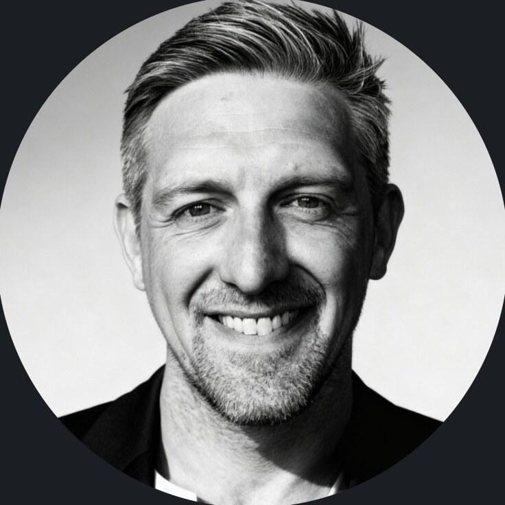 Gary Novak, Founder and Director of Illuminair, in a black-and-white portrait